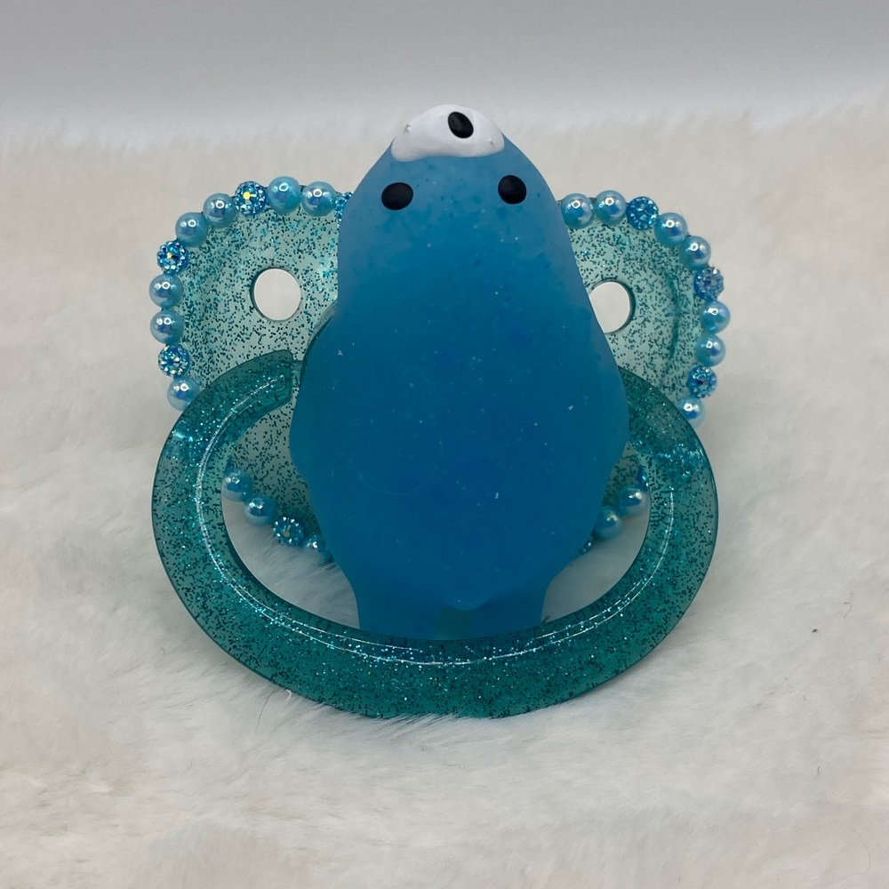 Blue squishy adult pacifier